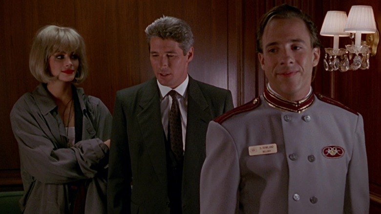 a couple with a bellhop