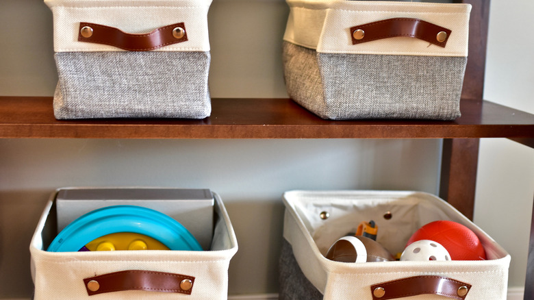 bookshelf with storage bins