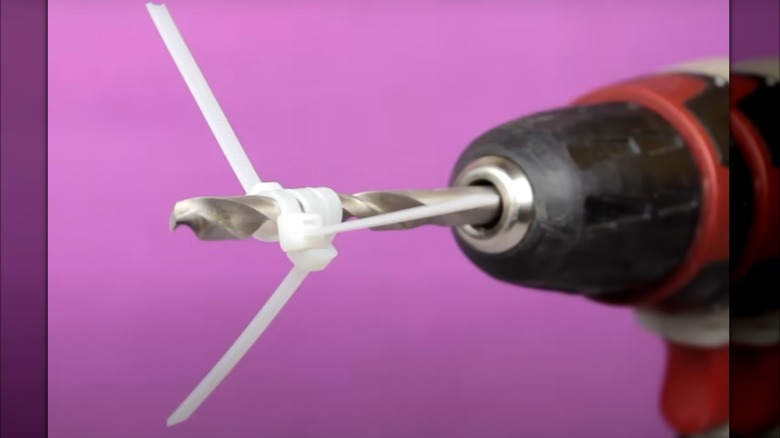 Zip ties attached to drill bit